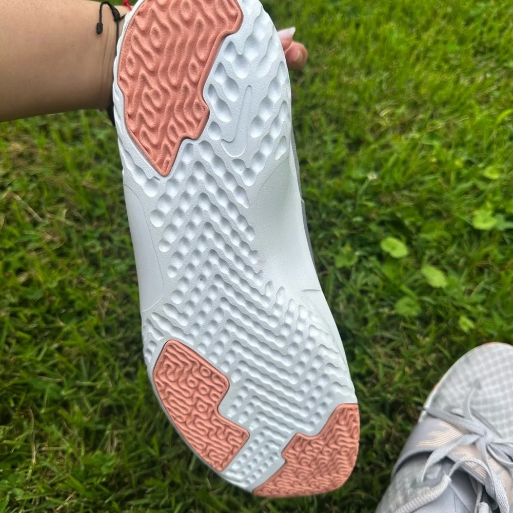 Nike Gray and Pink Sneakers with Cushioned Sole
